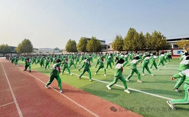 阳光体育人人参与 花香六小加速奔跑——未央区六村堡小学扎实开展“阳光体育”活动纪实(图5)